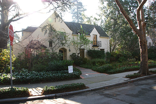 House with proposal sign in yard