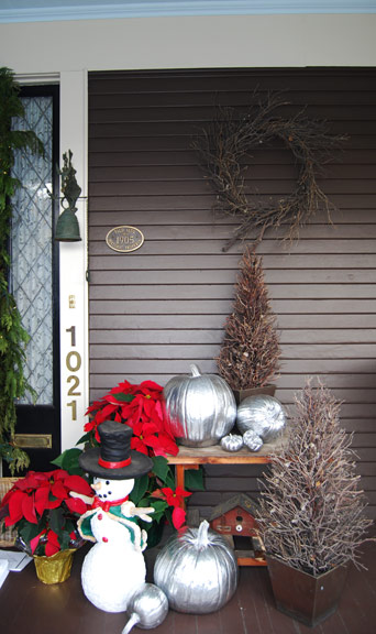 Porch with centennial plaque