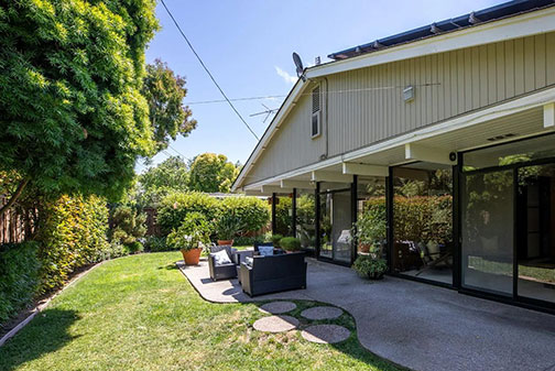 back of house with patio