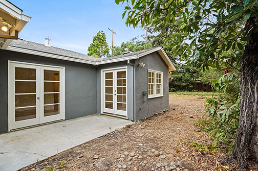 side patio with back bedroom