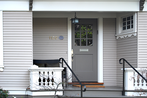 porch with centennial plaque