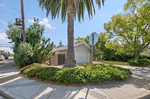 street corner and driveway with garage