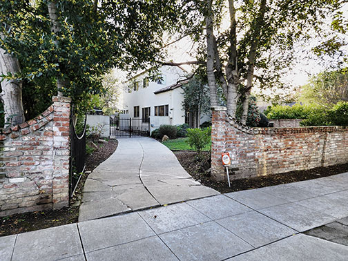 brick wall and driveway