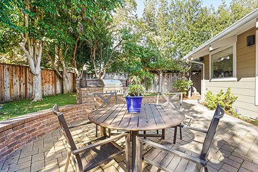 back corner and patio with grill